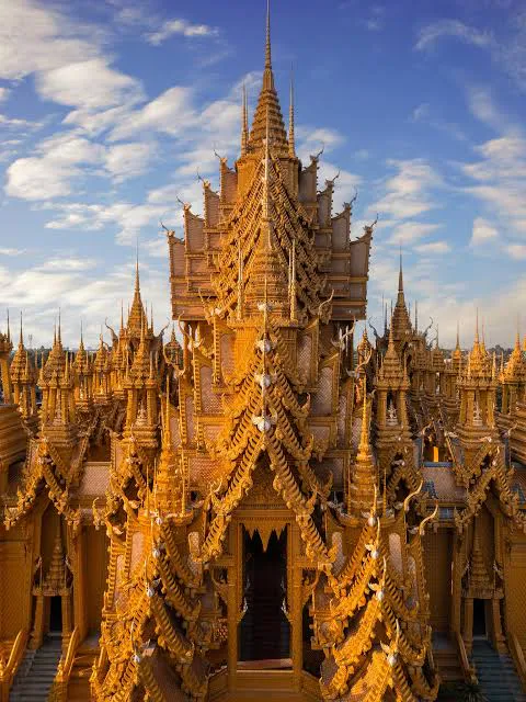 Close view of layered golden roof gables at Wat Chan Tawan Tok