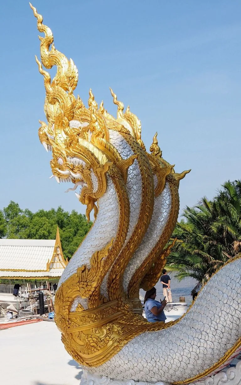 Gold-and-silver multi-headed naga statue at Wat Phuttha Prommayan