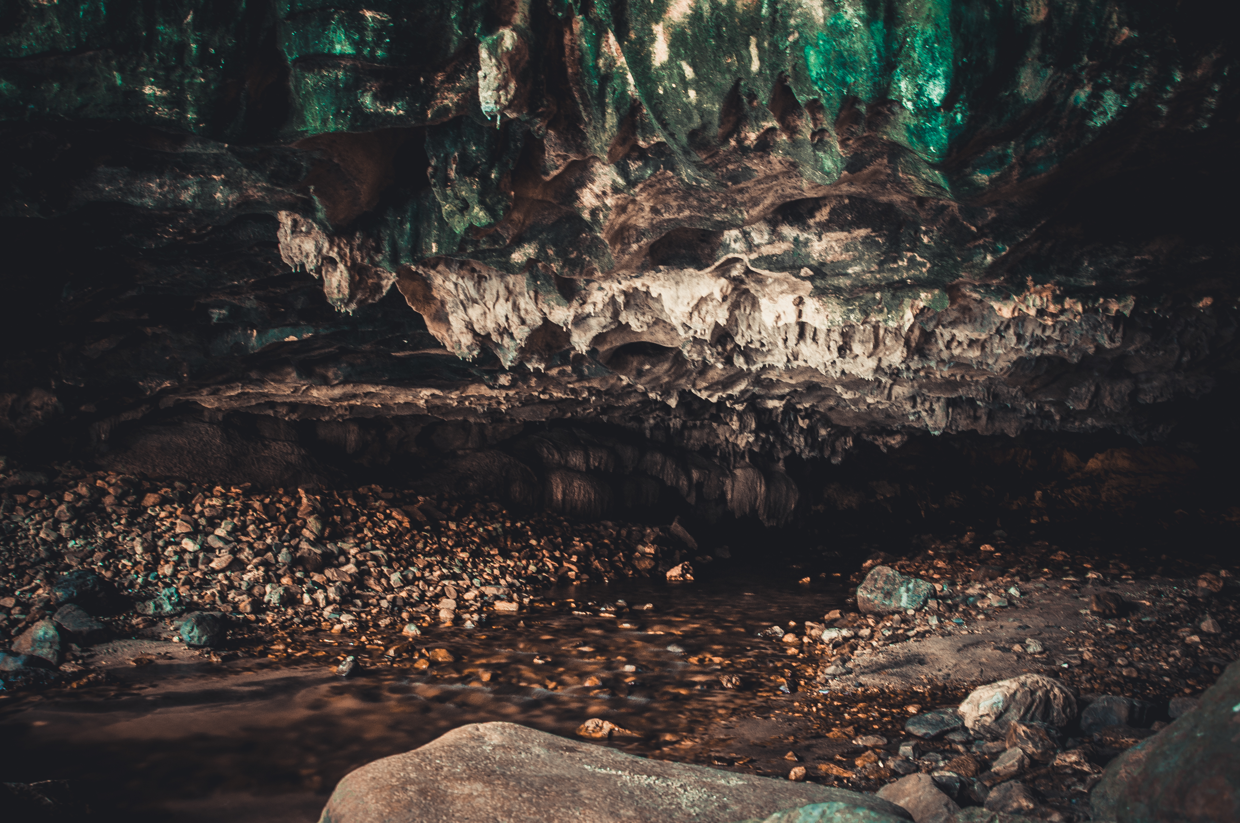 Underground stream flowing through limestone cave at Tham Than Lot Noi in Chaloem Rattanakosin National Park