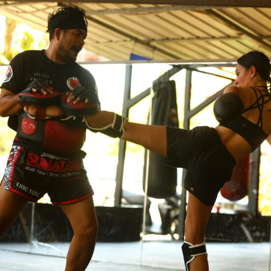 Pad work at Sumalee Boxing Gym in Phuket